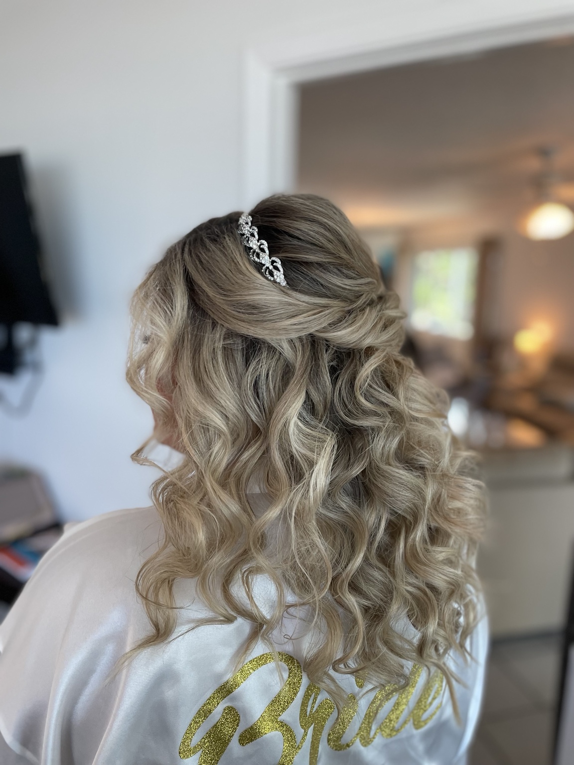 Long blonde half-up bridal curls from behind