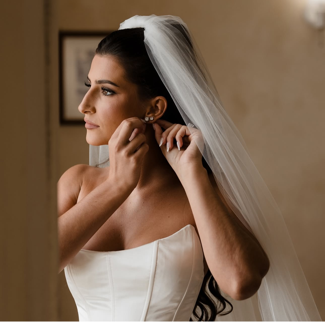 Bridal waves beneath a long veil